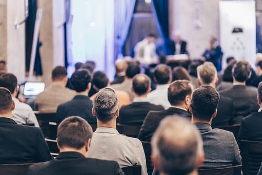 Round table discussion at business convention and Presentation. Audience at the conference hall. Business and entrepreneurship symposium.