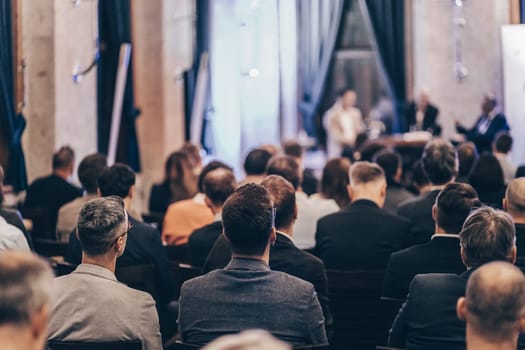 Round table discussion at business convention and Presentation. Audience at the conference hall. Business and entrepreneurship symposium.