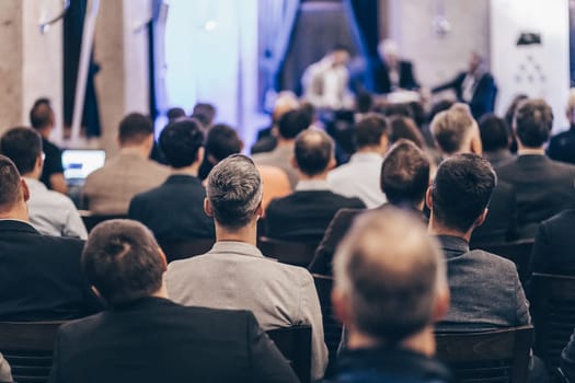 Round table discussion at business convention and Presentation. Audience at the conference hall. Business and entrepreneurship symposium.