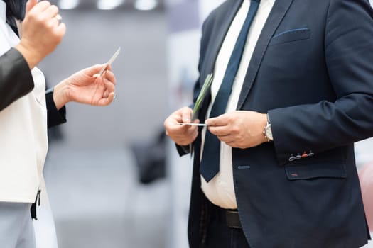 Business people exchanging business card on business meeting, Business discussion talking deal concept.