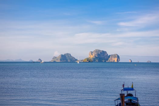 Sail boats with Ko Poda and Ko Kai Chicken Island in the background, Tonsai Bay, Railay Beach, Ao Nang, Krabi, Thailand.