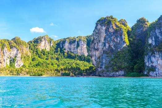 Cliff rocks with azure water in Tonsai Bay, Railay Beach, Ao Nang, Krabi, Thailand.