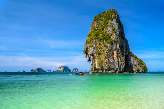 Huge cliff rock in azure water, Ko Rang Nok, Ao Phra Nang Beach, Ao Nang, Krabi, Thailand.