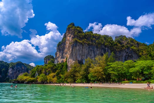 Rocks, water and tropical white sand beach, Railay beach west, Ao Nang, Krabi, Thailand.