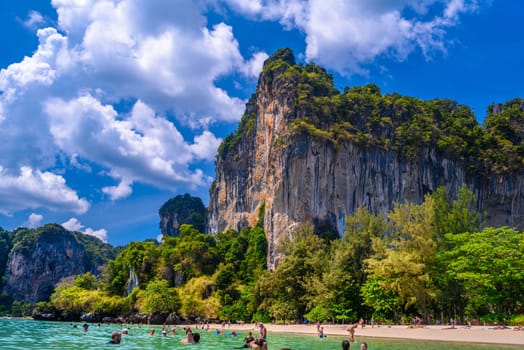 Rocks, water and tropical white sand beach, Railay beach west, Ao Nang, Krabi, Thailand.