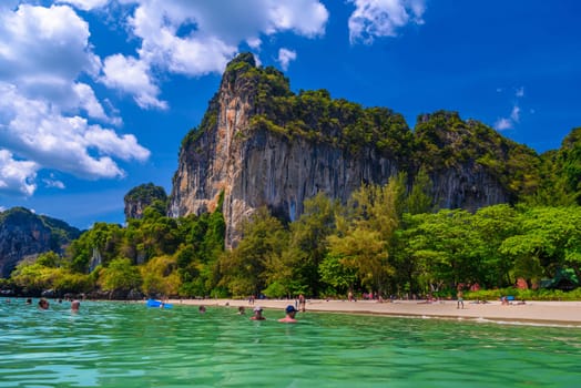 Rocks, water and tropical white sand beach, Railay beach west, Ao Nang, Krabi, Thailand.