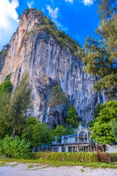 House near cliffs on Tonsai Bay, Railay Beach, Ao Nang, Krabi, Thailand.