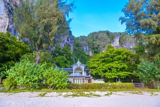 House near cliffs on Tonsai Bay, Railay Beach, Ao Nang, Krabi, Thailand.