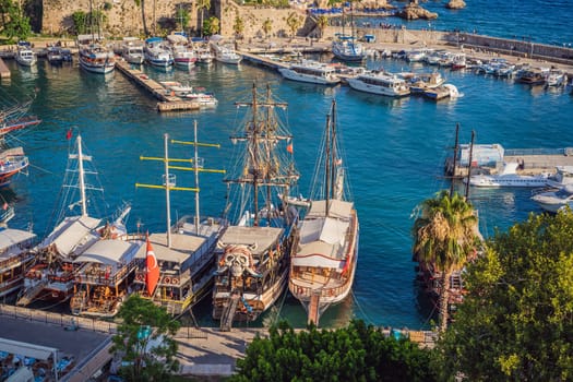 Old town Kaleici in Antalya. Panoramic view of Antalya Old Town port, Taurus mountains and Mediterrranean Sea, Turkey.