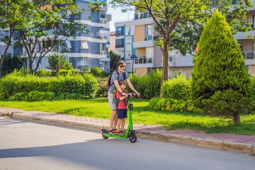 The father riding the electric scooter with his son in the city.