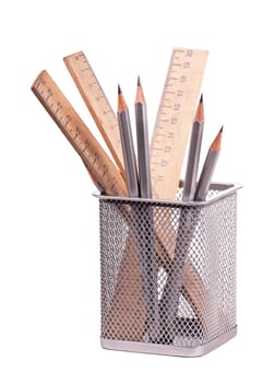 Some gray pencils and wooden rulers in office support on a white background