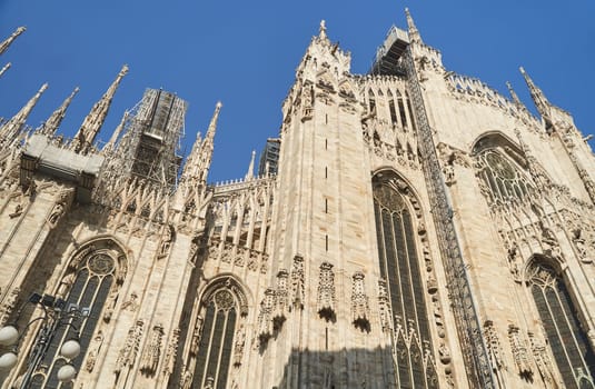 Milan, Italy - February 15, 2023: Milan Cathedral in Piazza Duomo during the day, Milan. Cathedral of the Duomo.