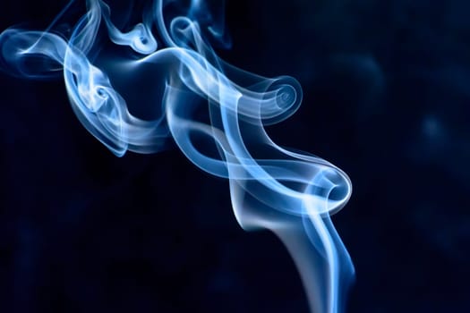 The smoke is colorful. It is abstract.