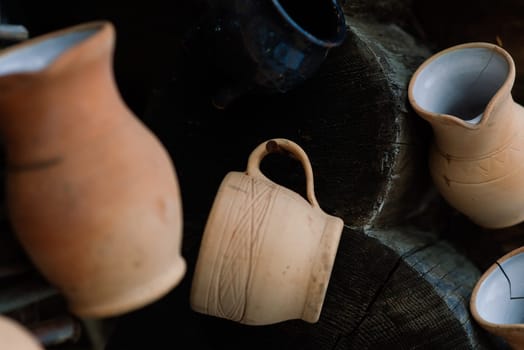 Ceramic clay terracotta jug, pot, vase, kitchen souvenirs in handmade ceramics street store.