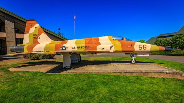 McMinnville, Oregon - August 21, 2017: US Air Force Northrop F-5E Tiger II with desert strip on exhibition at Evergreen Aviation & Space Museum.