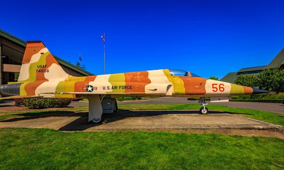 McMinnville, Oregon - August 21, 2017: US Air Force Northrop F-5E Tiger II with desert strip on exhibition at Evergreen Aviation & Space Museum.