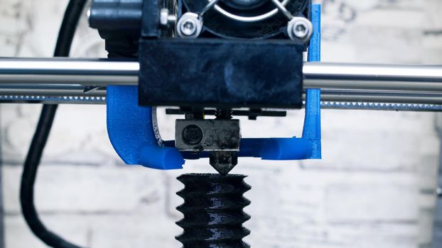 Printing a part on a 3D printer close up