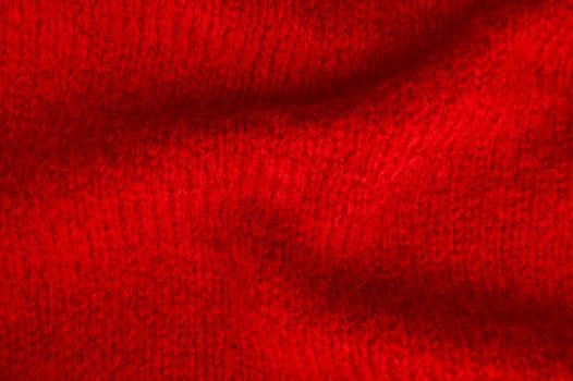 Cotton Abstract Wool. Organic Woven Texture. Closeup Jacquard Holiday Background. Knitted Fabric. Red Fiber Thread. Scandinavian Warm Decor. Detail Cloth Material. Macro Knitted Wool.