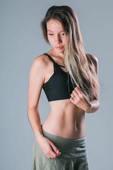 Portrait of young slim fitness woman. Sport and healthy lifestyle concept