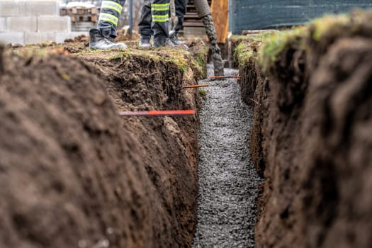 concrete in the ground for the foundation of the building. High quality photo