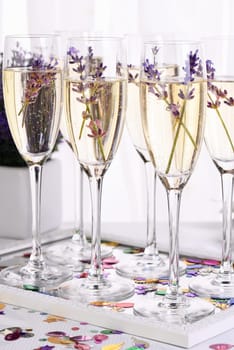 Lavender mood. Champagne with soft gentle notes of lavender. A drink for a festive dinner. Party theme ideas.