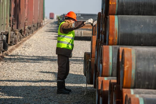 A line of oilfield large streel pipes in industrial construction area