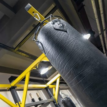 A closeup of a boxing punching bag in the sports complex