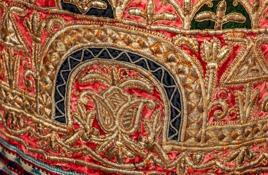 The decorative elements and ornaments on the national clothes of Uzbekistan