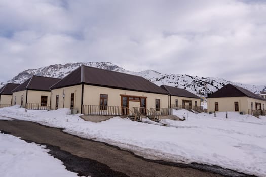 The cottages surrounded by snow in a recreation area in the mountains