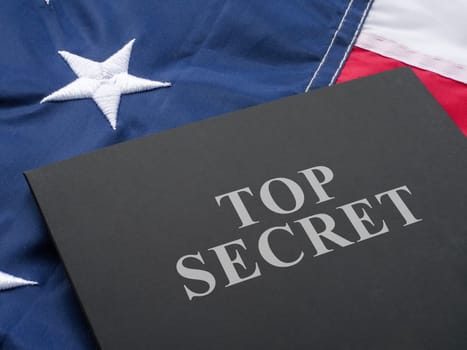 US flag and folder labeled Top Secret.