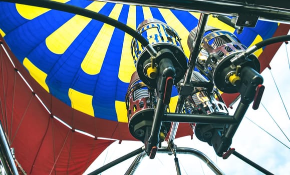 Bottom view of hot air balloon engine during festival in Cappadocia, Turkey