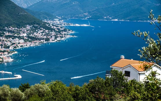 Kotor town and bay scenic view in Montenegro from above. Amazing aerial panorama on Adriatic sea, cityscape and mountains