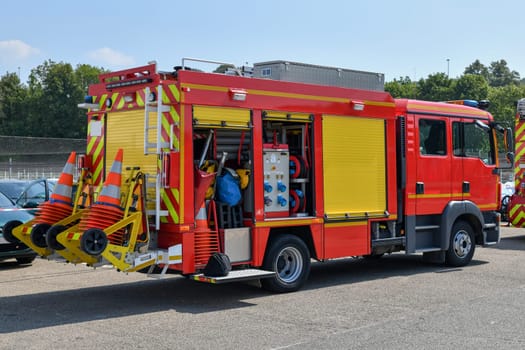 Big red fire engine with fire equipment