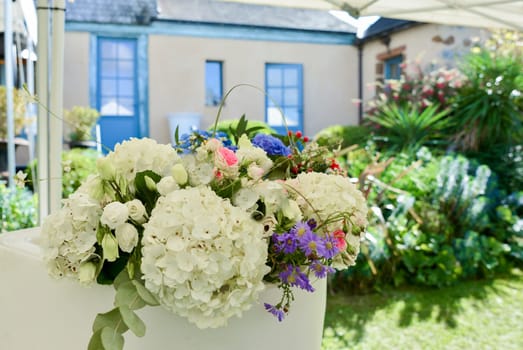 A bouquet of hydrangea, rose lisianthus and flowers in the garden