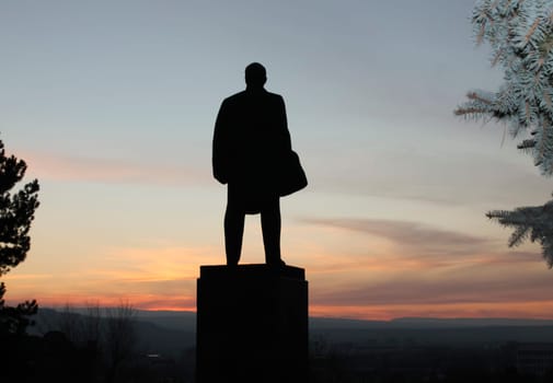 Monument of Vladimir Lenin on the sunset