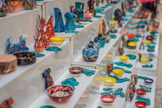 Collection of turkish ceramics on sale at the Grand Bazaar in Istanbul, Turkey. Turkish colorful ornamental ceramic souvenir plates.