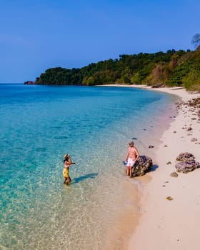 drone view at the beach of Koh Kradan island in Thailand, aerial view over Koh Kradan Island Trang during vacation in Thailand