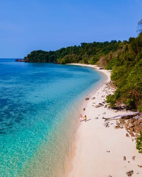 drone view at the beach of Koh Kradan island in Thailand, aerial view over Koh Kradan Island Trang during vacation in Thailand