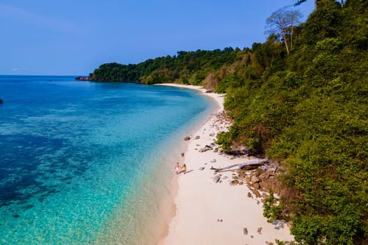 drone view at the beach of Koh Kradan island in Thailand, aerial view over Koh Kradan Island Trang during vacation in Thailand
