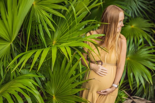 Pregnant woman walks in park at evening. Family enjoying pregnancy. The concept of Mother's Day and Women's Day.