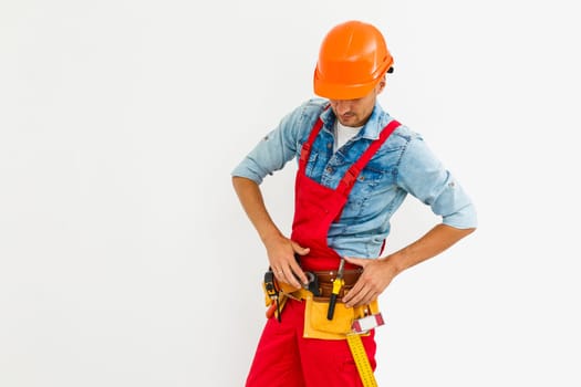 profession, construction and building - happy smiling male worker or builder in helmet over white background