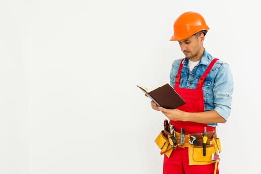 worker with notebook over white background.