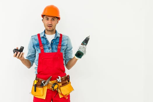 Construction worker with helmet and screwdriver.