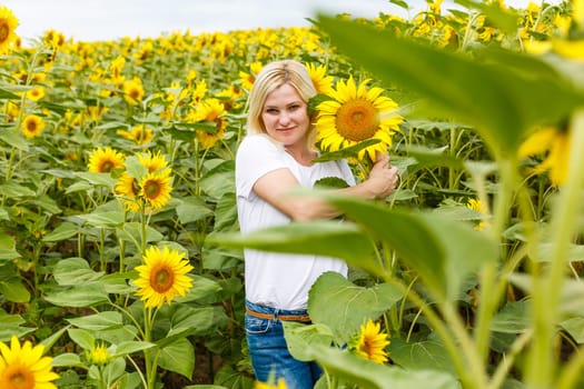 smiling woman in sunflower field nature sun.