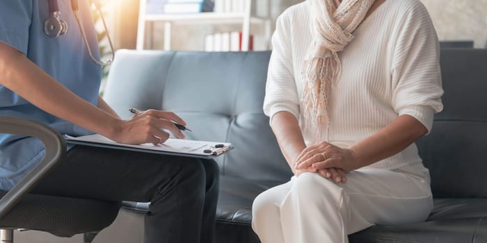 Asian senior female patient consult with physician nurse at nursing home..