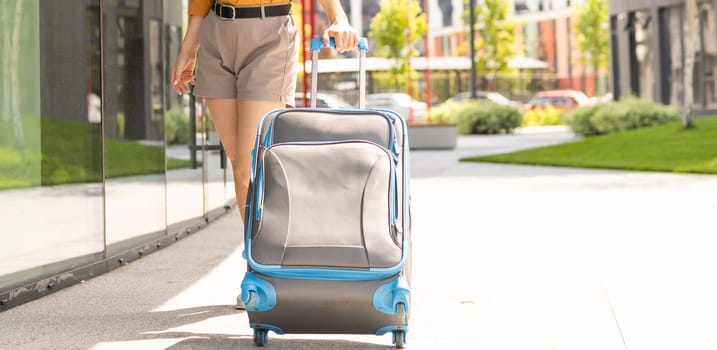 Woman with luggage. travels over the world.