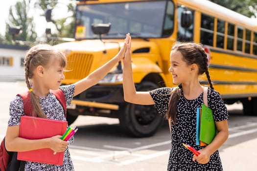 Happy Schoolgirls outdoor. Back to School.