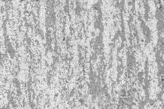 Grey peeling paint abstract gray pattern design worn weathered white wall surface texture background.