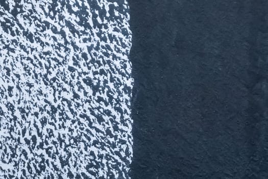 Abstract paint pattern design dark blue and white wall grunge background texture.