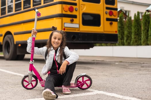 Child going back to school. Start of new school year after summer vacation. Little girl with backpack and books on first school day. Beginning of class.